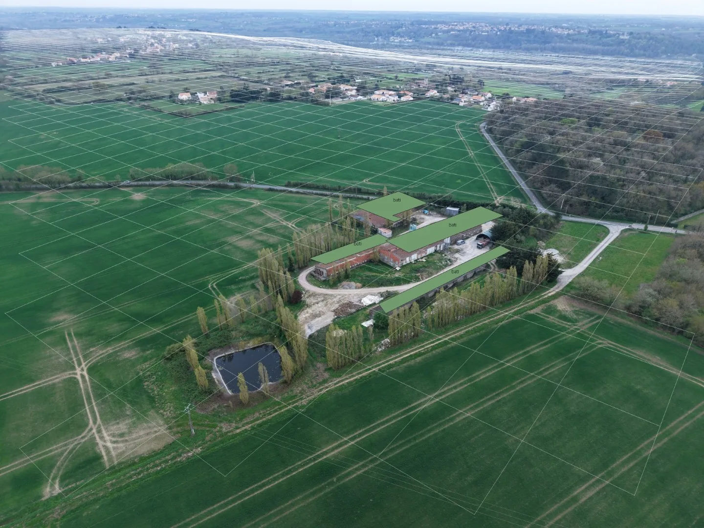 GIS polygon overlay projected over an aerial photo